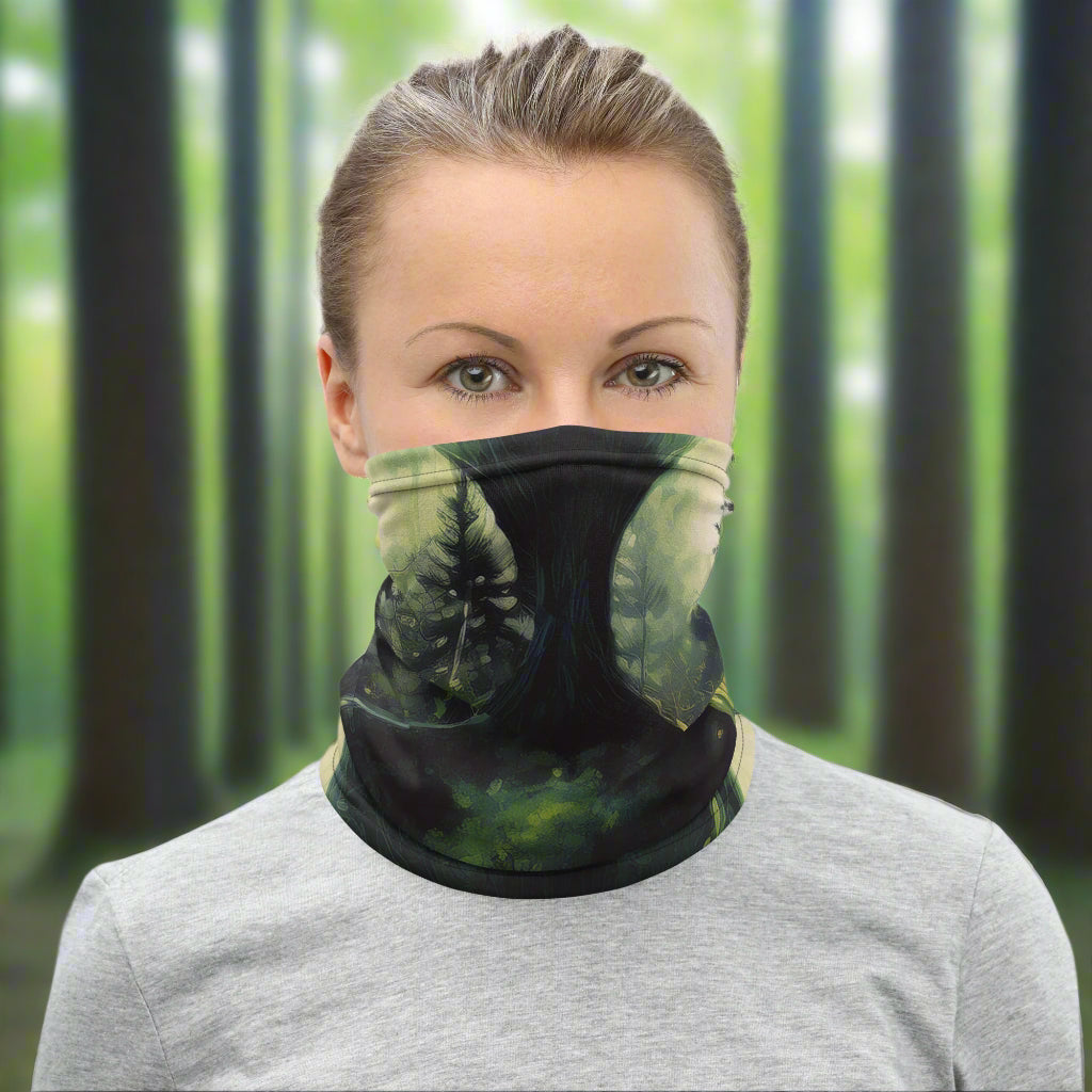 Woman wearing a neck gaiter from Rosenmay Studio with a print of a dark forest