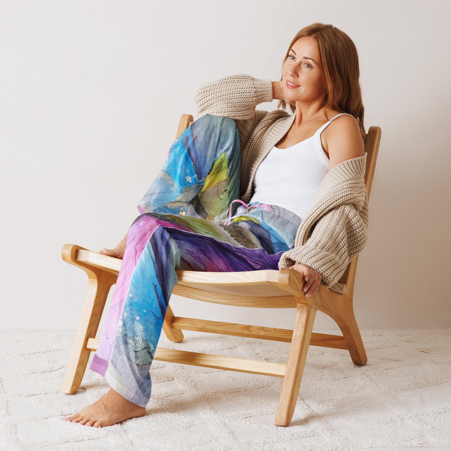 Woman wearing long, soft, pajama pants with abstract floral print from Rosenmay Studio