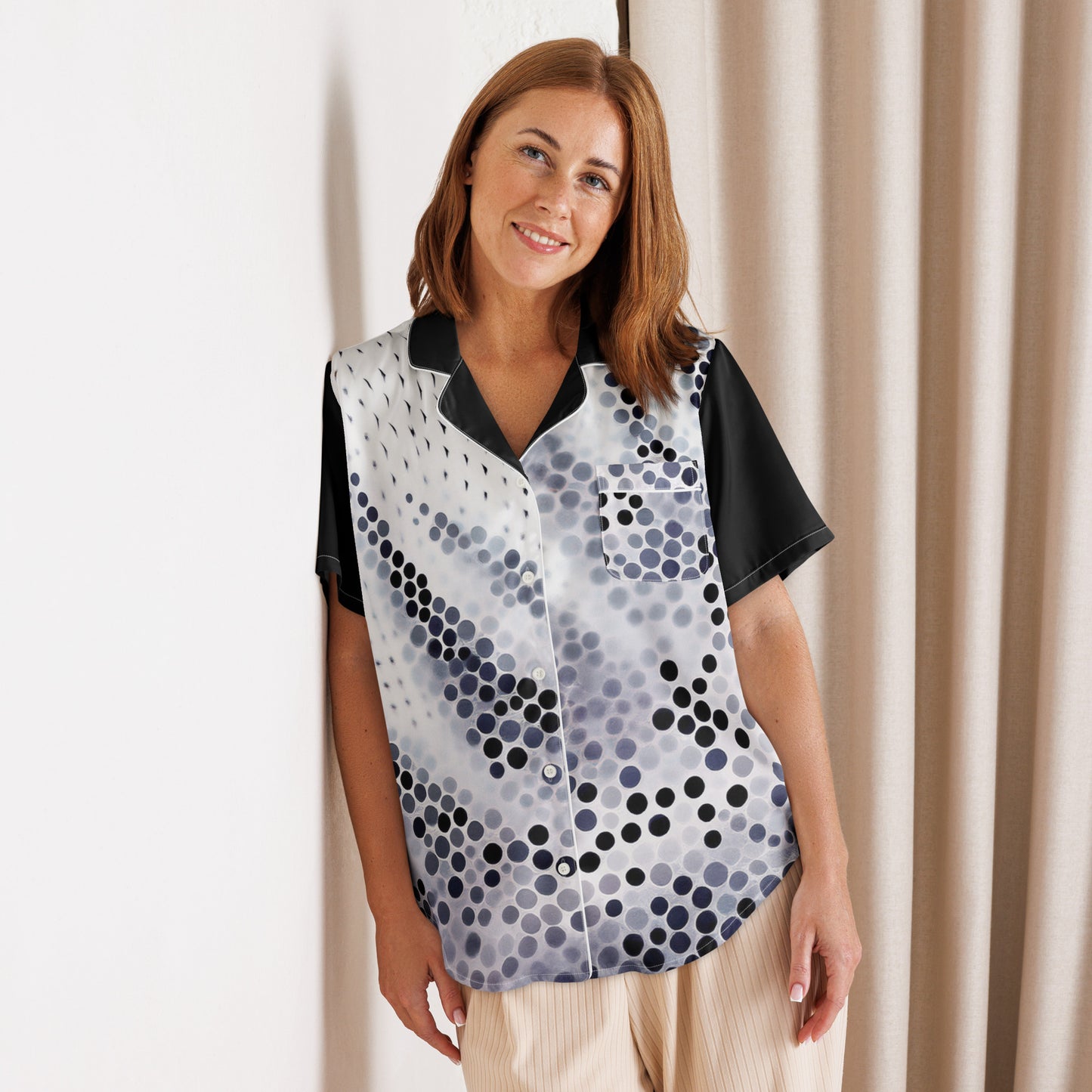 Woman wearing a short sleeve pajama top with abstract dotted print from Rosenmay Studio