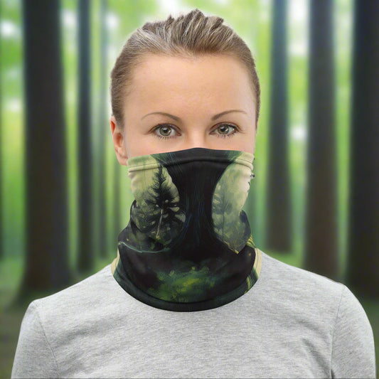 Woman wearing a neck gaiter from Rosenmay Studio with a print of a dark forest